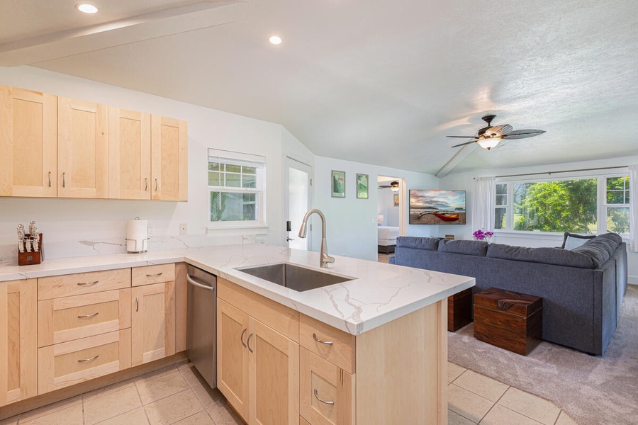 Functional kitchen with island seating and open flow into the living space.