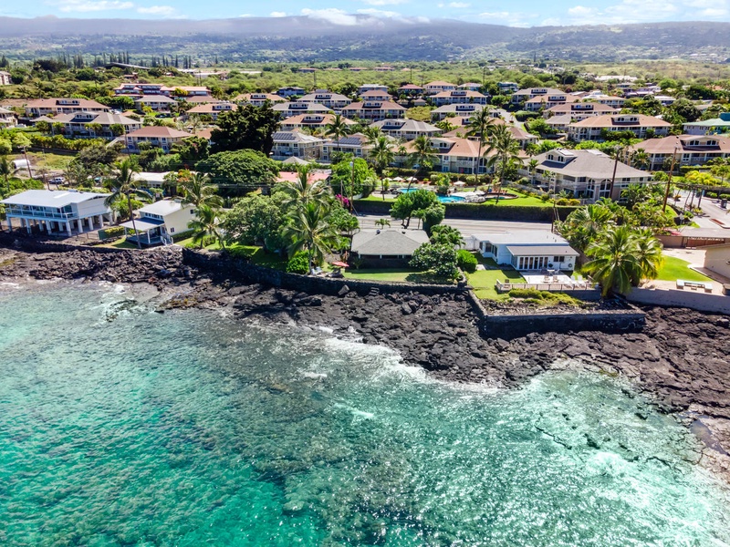 Aerial view of the home set right along Kona’s stunning shoreline.
