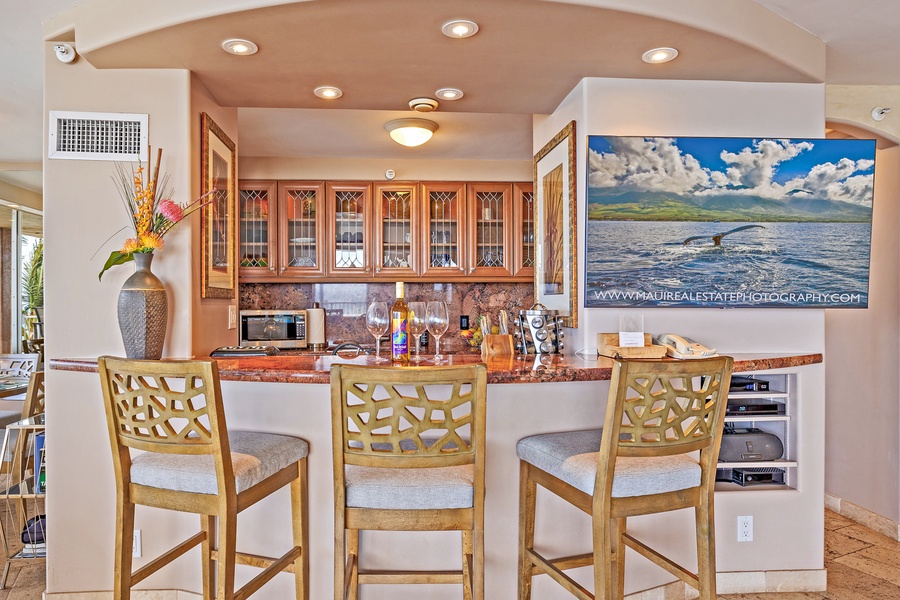 The bar area at Royal Kahana 610 is a cozy spot to enjoy a drink or a quick snack with friends.