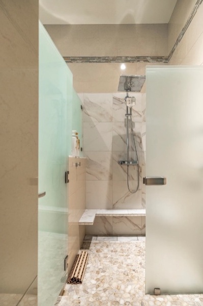 The third bathroom also provides spa-like luxury with walk-in shower