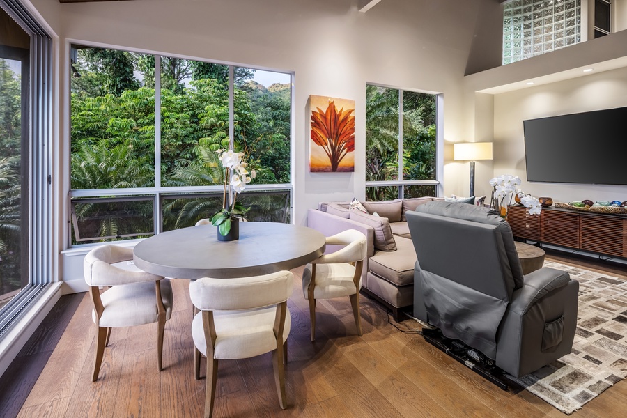 Casual dining nook and living space with forest views and tranquil energy for slow mornings.