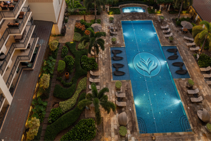 Aerial view of the pool with sun loungers.