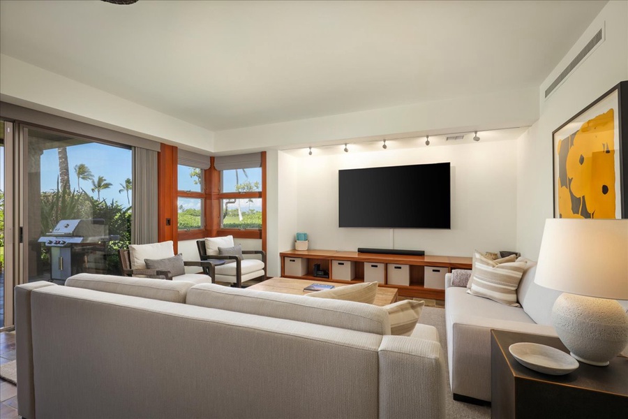 The living room seating is perfect for gathering and entertainment.