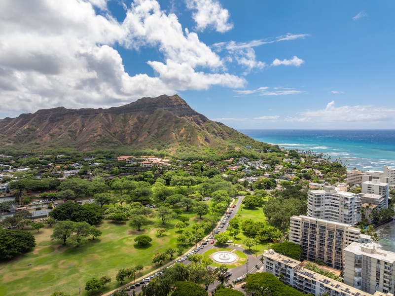 Panoramic view of Diamond Head and the surrounding golf course, offering a lush and serene backdrop.