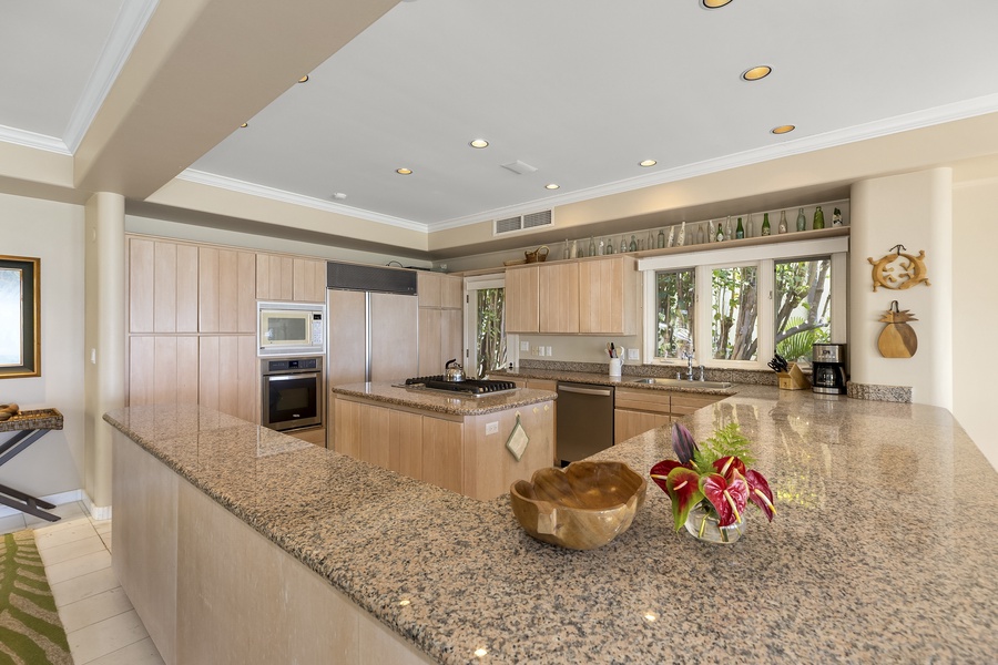 Kitchen is spacious with plenty of counter space.
