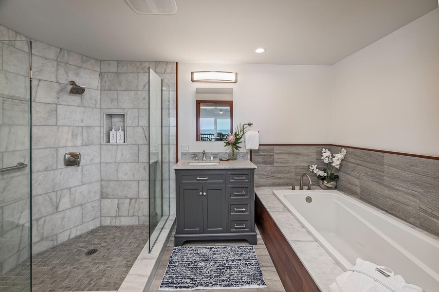 Guest bathroom with walk-in shower and soaking tub