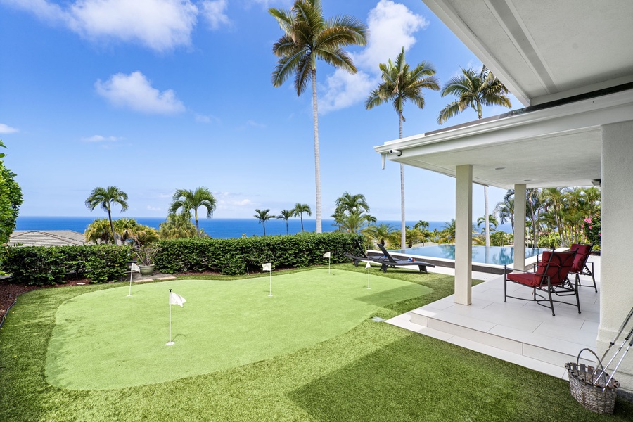 Resort-style backyard with putting green and ocean views—ideal for unwinding island-style.