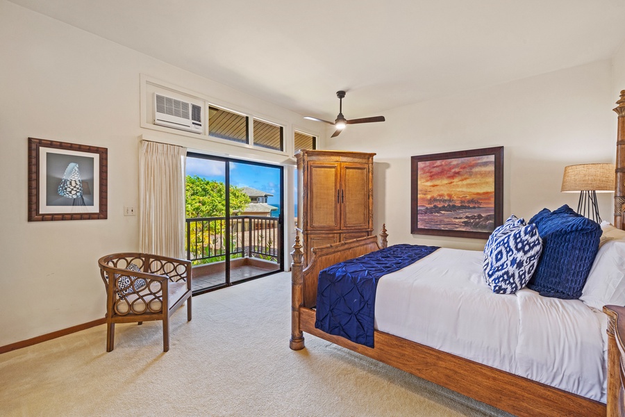 This bright and inviting bedroom features a cozy bed and opens to a private lanai