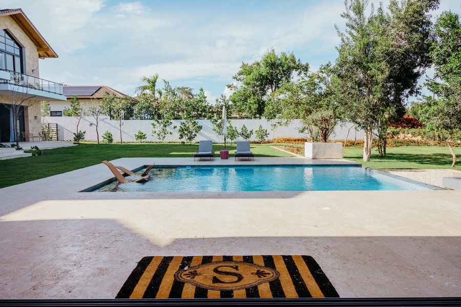 The view of the pool from the second living and dining area.