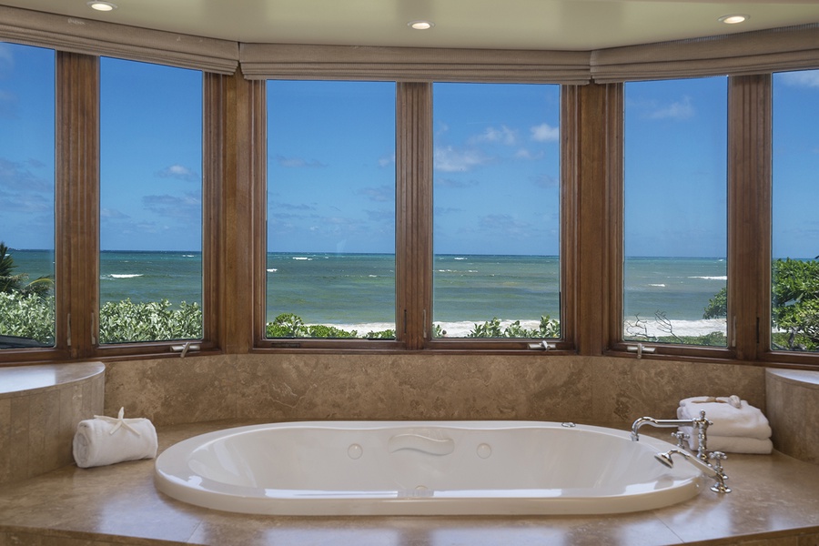 Main house: Primary Bathroom jetted tub that overlooks Kailua Bay.