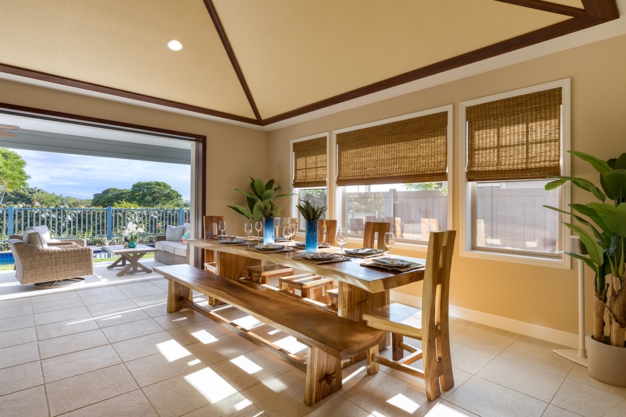 The spacious dining room, with the lanai beyond
