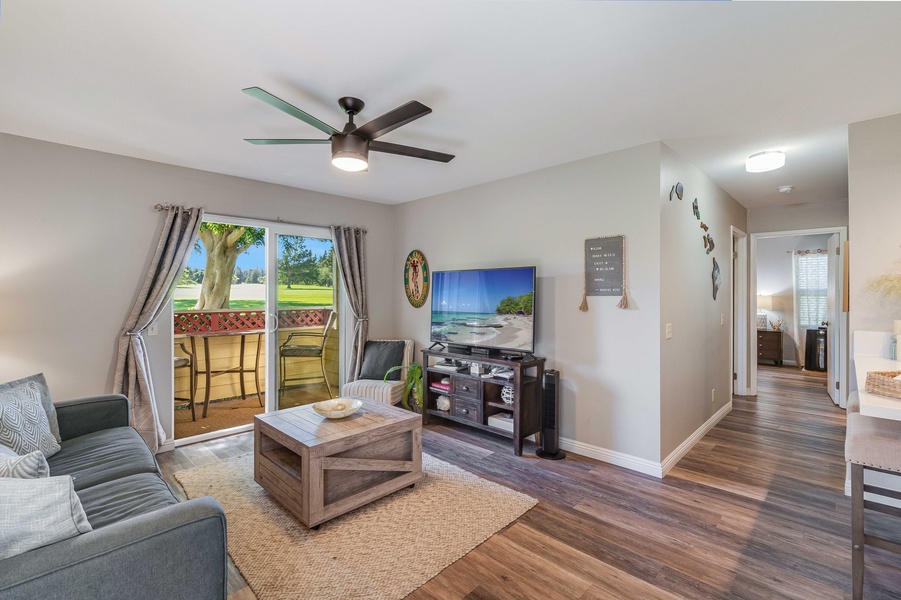 Living room with hallway leading to the bedrooms
