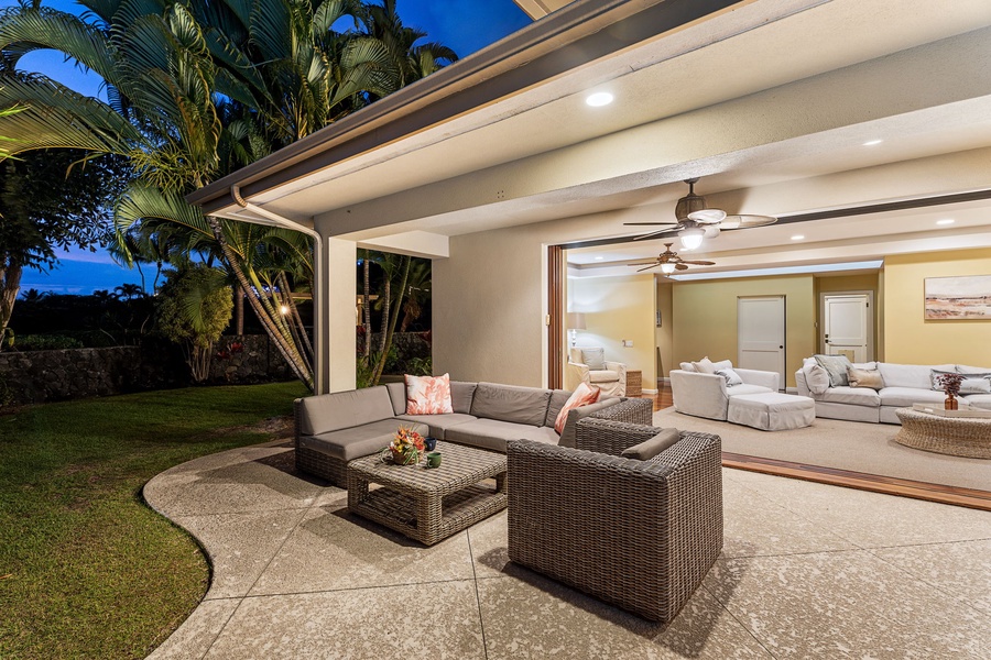 Spacious patio with a seating area, blending comfort and style for outdoor gatherings.