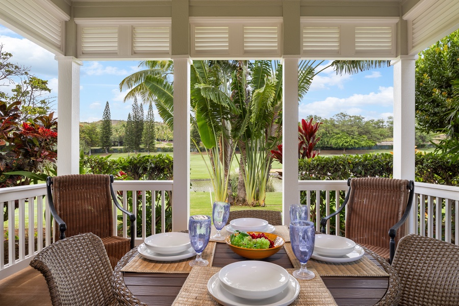 Enjoy tropical dining on your private lanai with stunning golf course views through swaying palms and vibrant foliage.