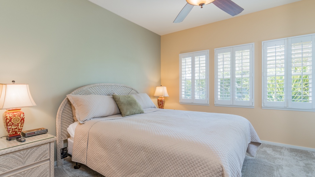 Have a restful night of sleep and wake up to scenic views in the primary guest bedroom.