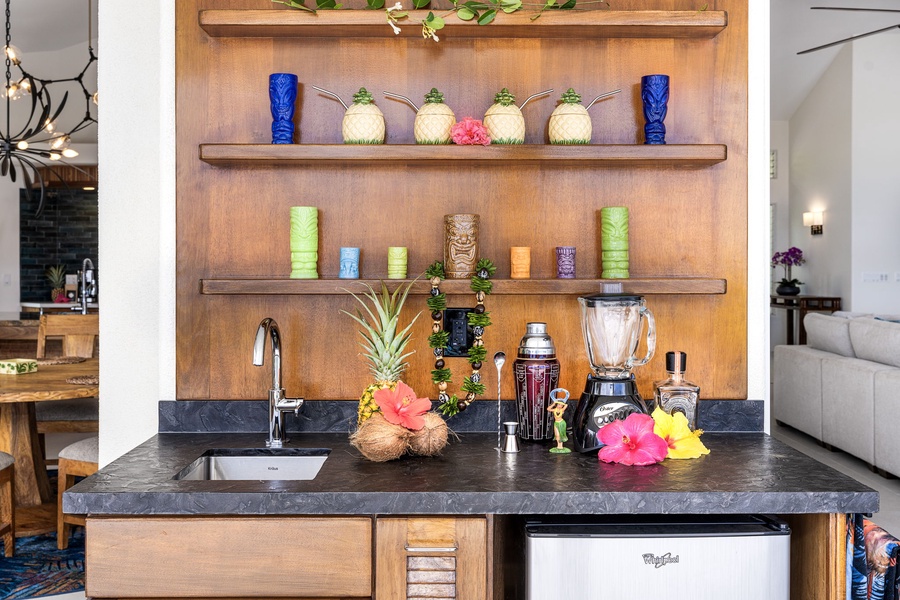 Tropical-themed wet bar adds playful energy to your gathering space, perfect for evening mocktails or mai tais.