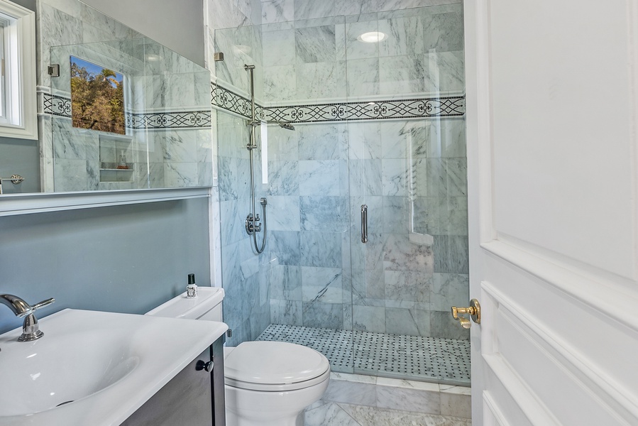 Ensuite bathroom with a walk-in shower.