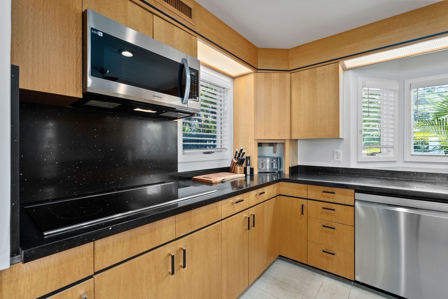 Enjoy cooking in this expansive kitchen with plenty of natural light.