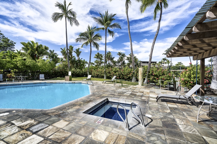 Hot tub adjacent to the pool