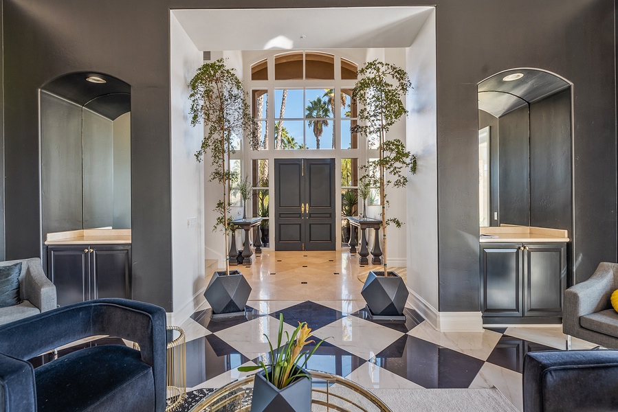 "Inviting foyer welcoming you to a realm of luxury and comfort.