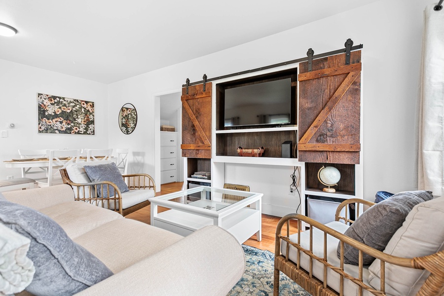 Relax and recharge in this thoughtfully styled living space—ideal for cozy mornings or movie nights with the whole crew.