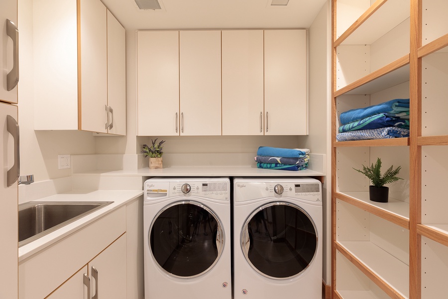 Roomy laundry area with a washer/dryer