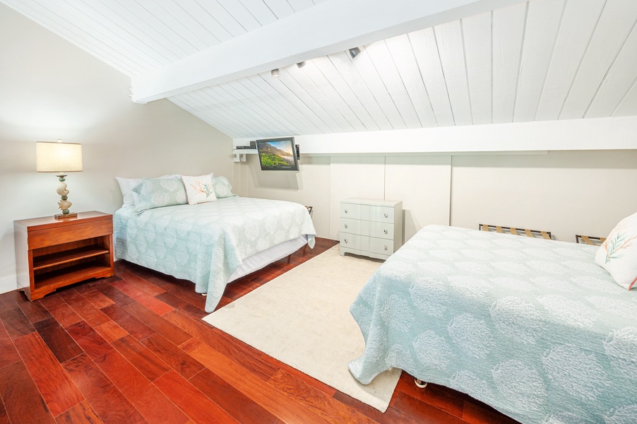 Two queen beds in the loft area will make it possible to travel in company