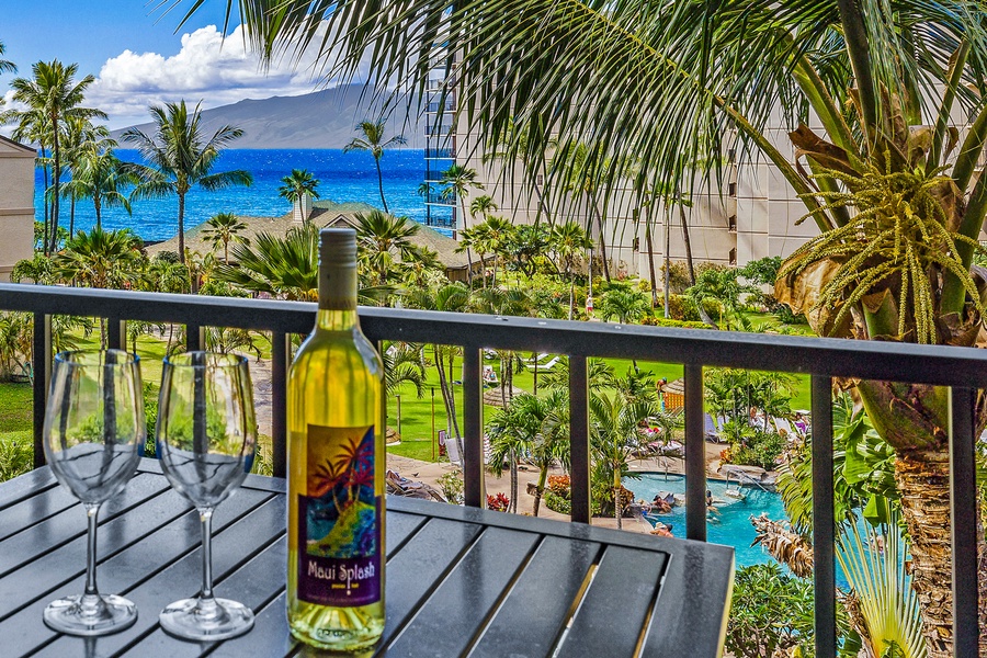 Enjoy a refreshing drink on the balcony while taking in the view of the pool and ocean.