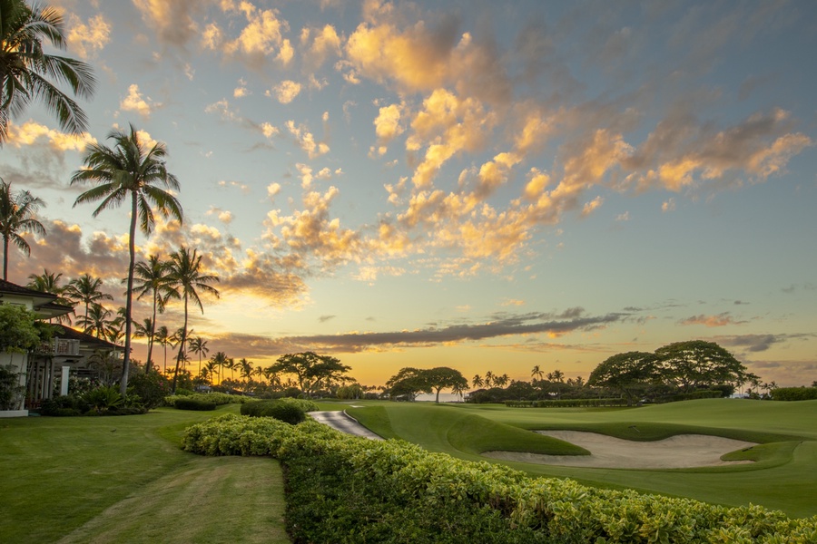 Captivating sunset views while out on a stroll on the Palm Villas back lawn