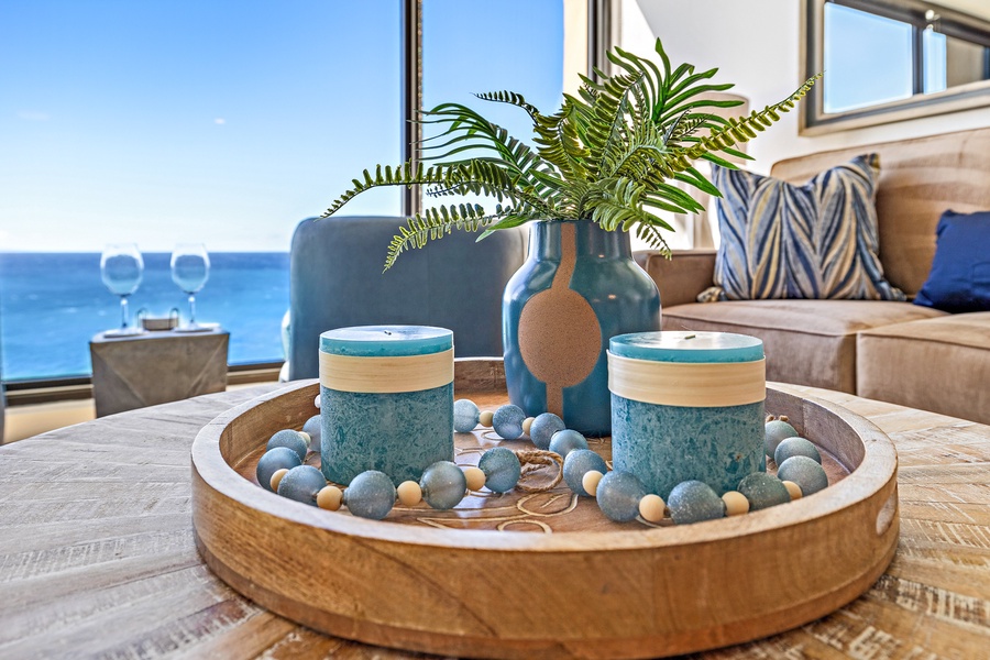 A beautifully curated coffee table tray featuring ocean-inspired accents, adding a touch of coastal charm to your living space