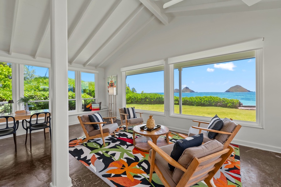 Casual comfort meets breathtaking ocean views—perfect for lounging with loved ones while the sea breeze drifts through.