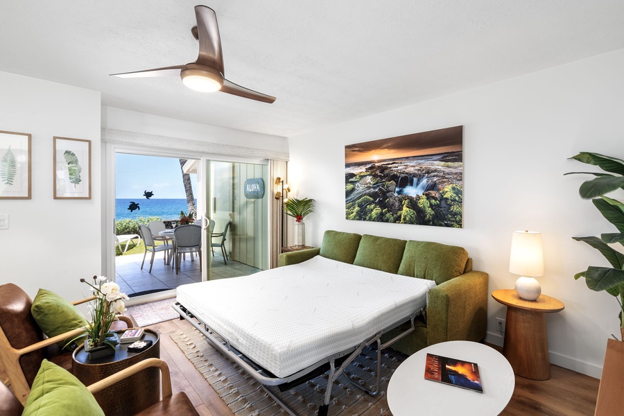 Relax with ocean views and the sound of waves from the great room's queen sleeper sofa.