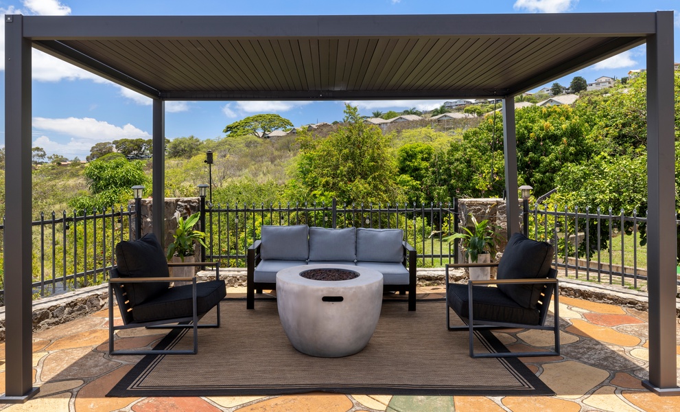 This shaded lanai lounge offers the perfect spot to cool off with a drink or enjoy evening conversation beneath the stars.