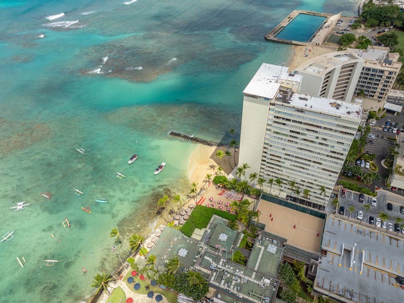 Overhead view of Colony Surf with private beach access, showcasing a rare blend of luxury and seclusion in Honolulu.