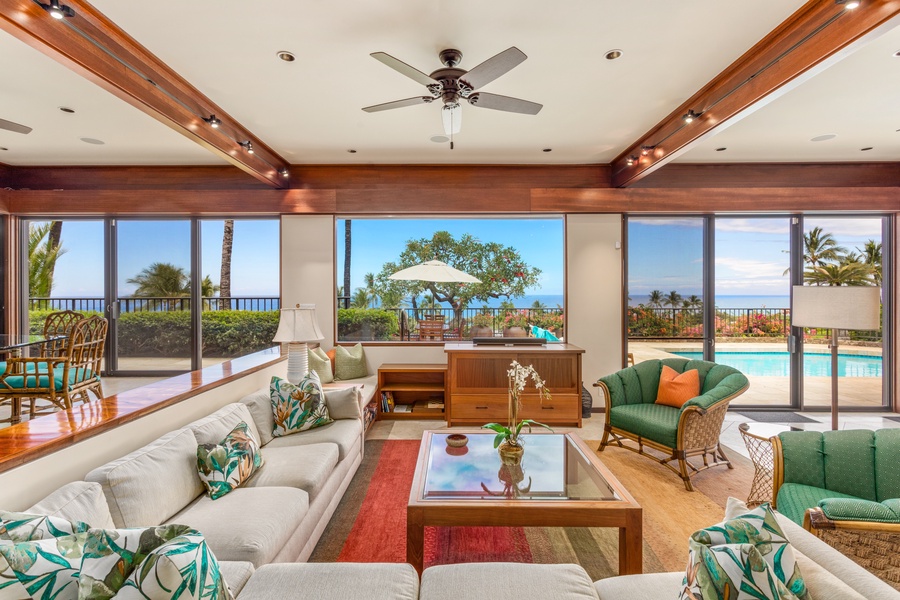 Bask in Ocean & Sunset Views from the Newly Redesigned Living Area. Sliding Glass Doors Open to Pool Deck & Lanai.