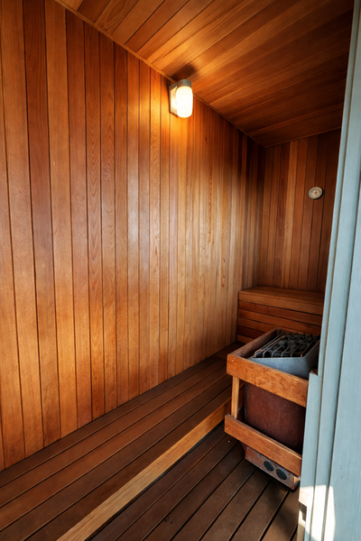 Five-person cedar sauna for post-swim recovery and quiet moments of warmth.