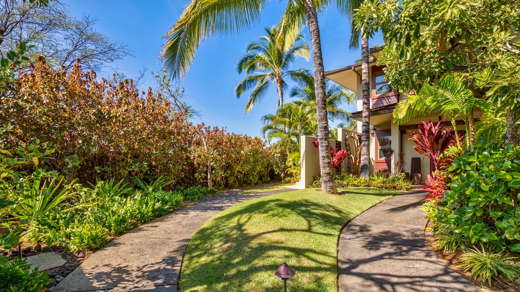 Courtyard entrance, beautifully landscaped.