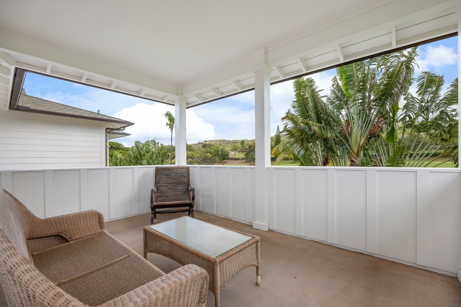 Your private covered terrace offers tropical garden views where you can unwind with morning coffee or evening relaxation.