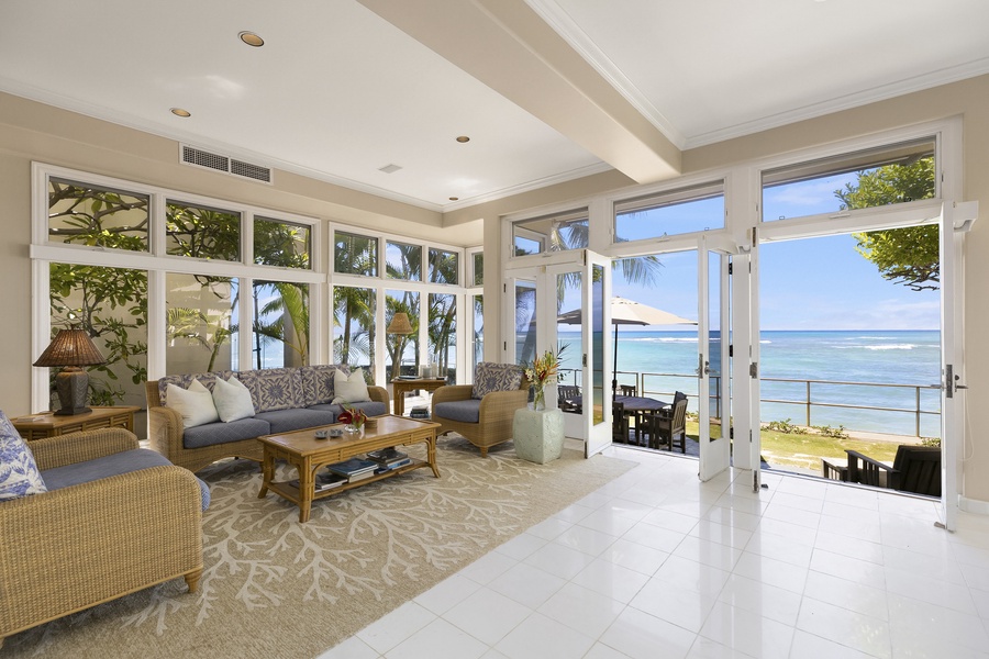 Living Room opens up to the Oceanside Lanai and Yard.
