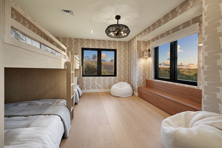 Bunk room with two full-over-full bunks, ocean views, and family-friendly design.