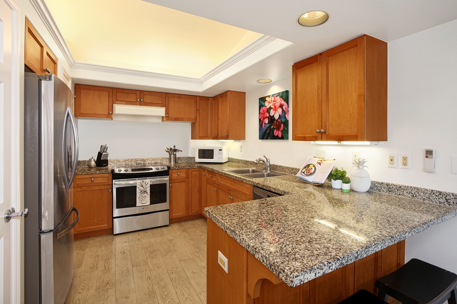 Spacious kitchen with ample counter space, great for preparing home-cooked meals.
