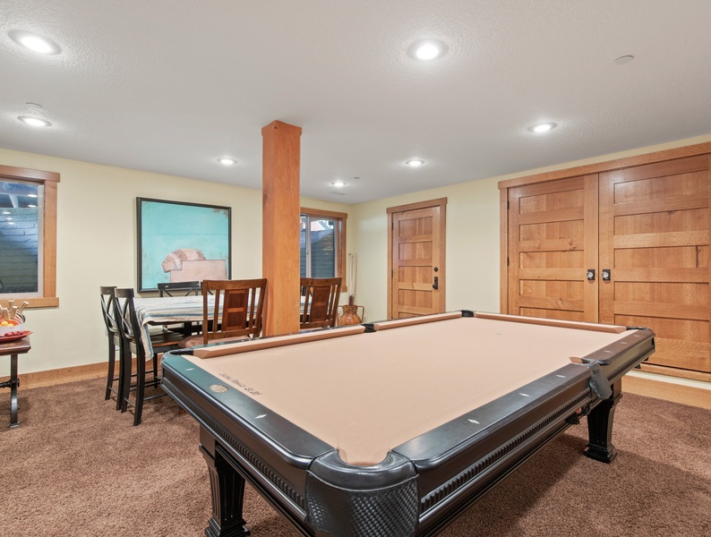 Unleash your competitive spirit at our den, complete with a captivating billiard table, providing endless entertainment and friendly competitions