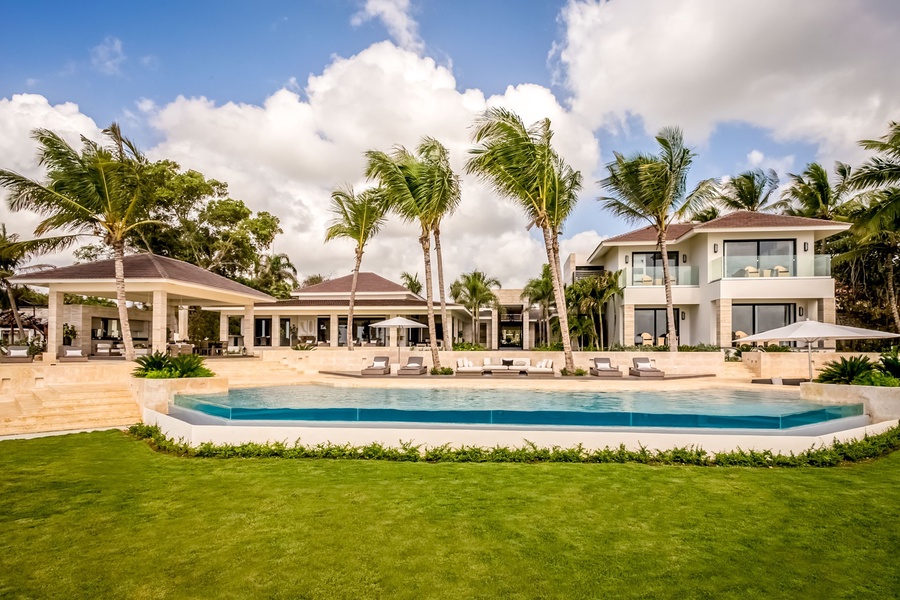 The expansive Casa de Campo estate, featuring lush greenery and a stunning pool area.