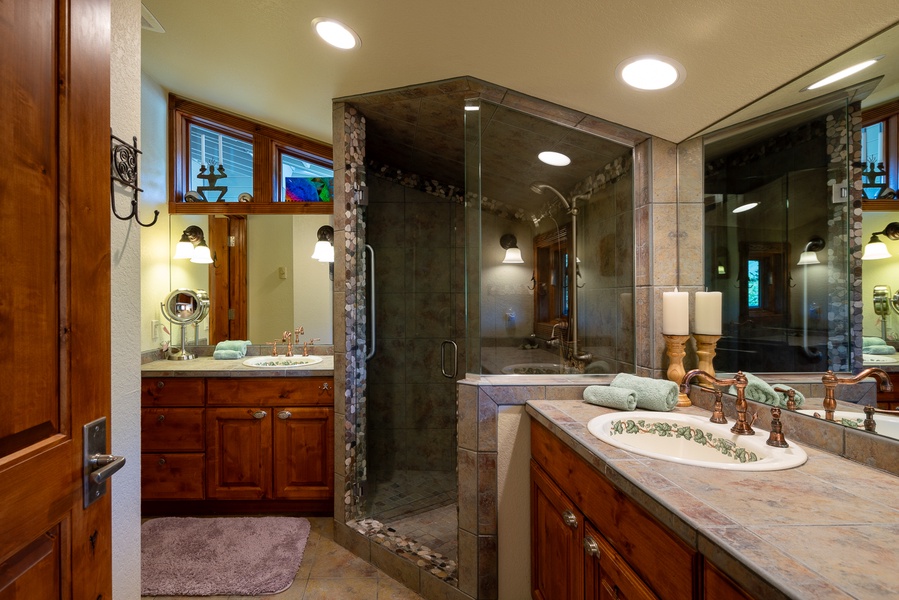 Ensuite bathroom and vanity area for personal care and relaxation.