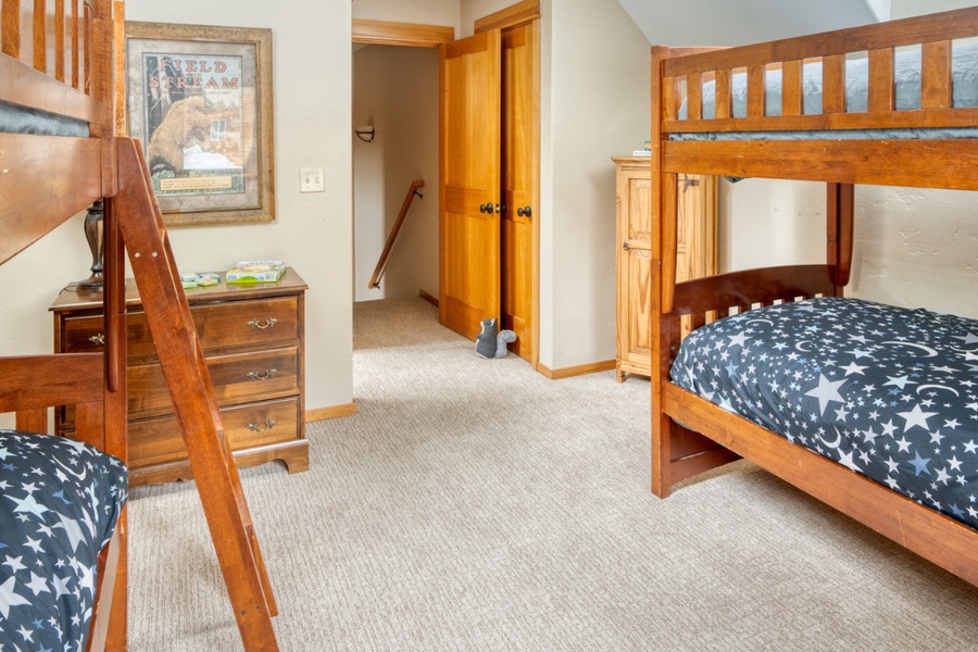 This guest bedroom also has dressers to keep your getaway essentials