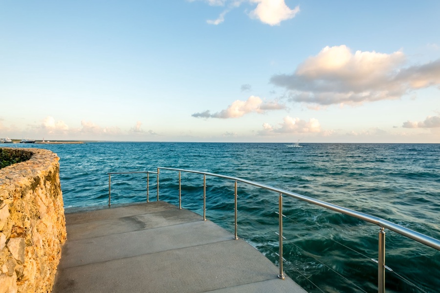 Stroll along the private pier and enjoy unobstructed views of the vast ocean.
