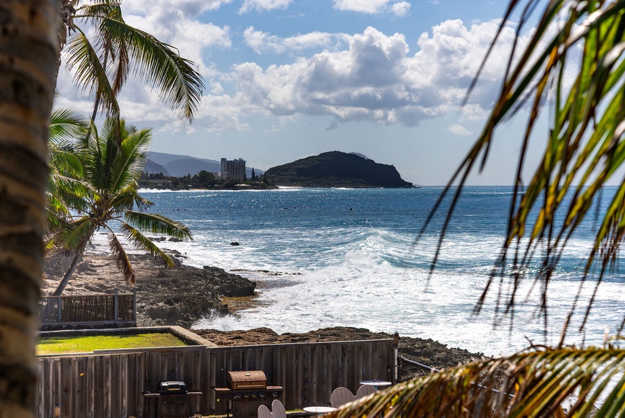 Waves crash against the lava rock shoreline just steps from your lanai.