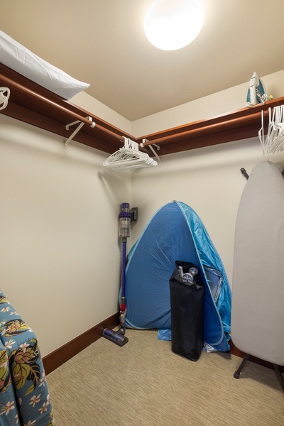 A utility closet with outdoor gear.