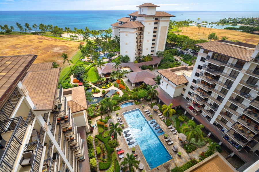 Resort pool view from the lanai with a glimpse of the ocean