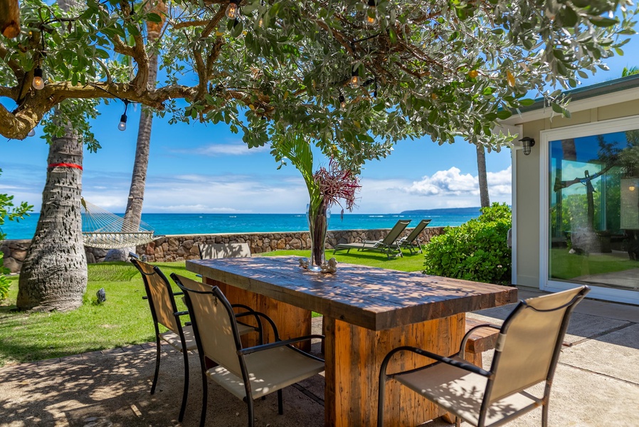Outside, you'll find a picnic table perfect for outdoor dining and ocean views